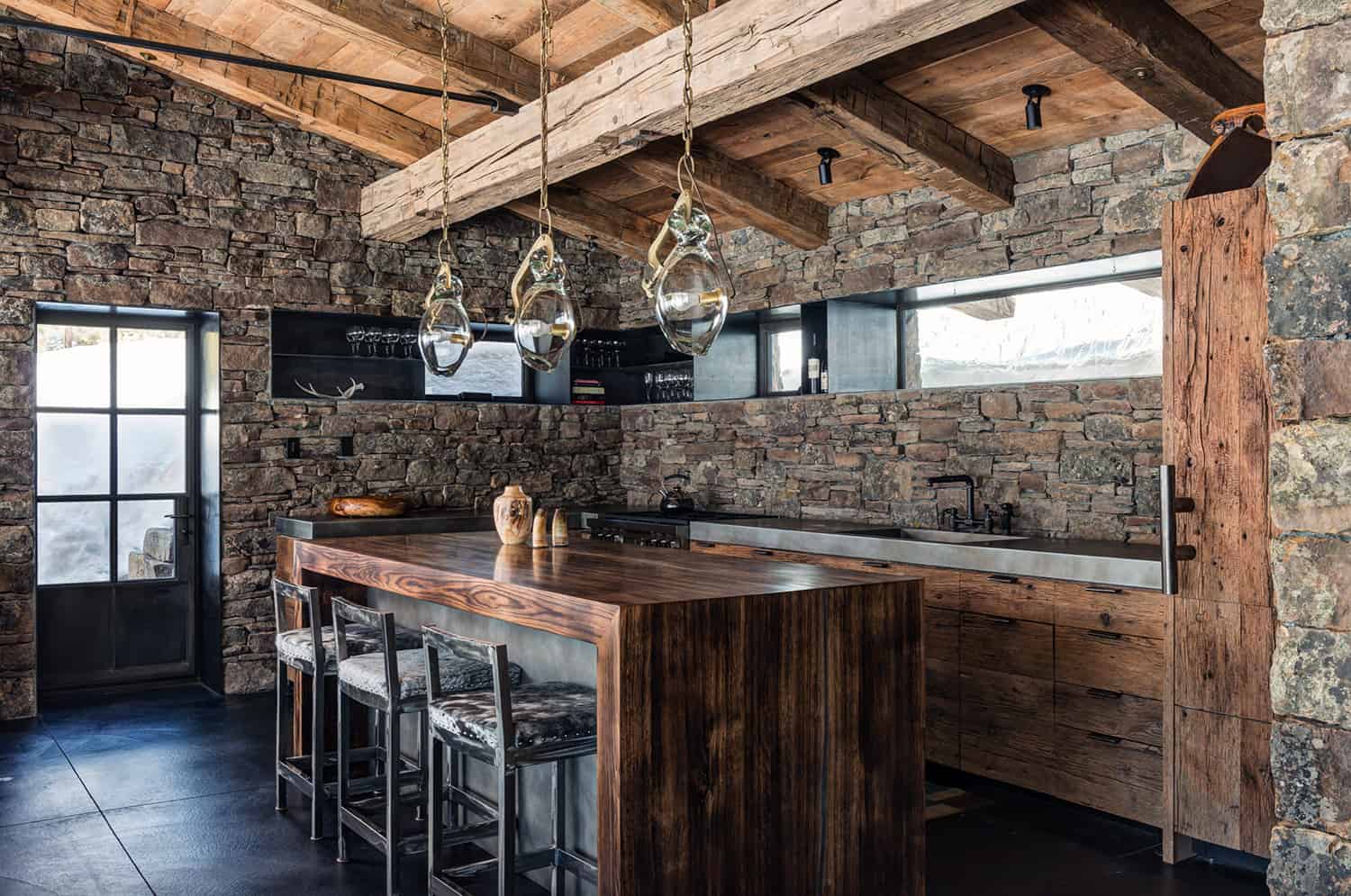 Natural and Manufactured Countertop Materials Kitchen interior featuring natural stone surfaces