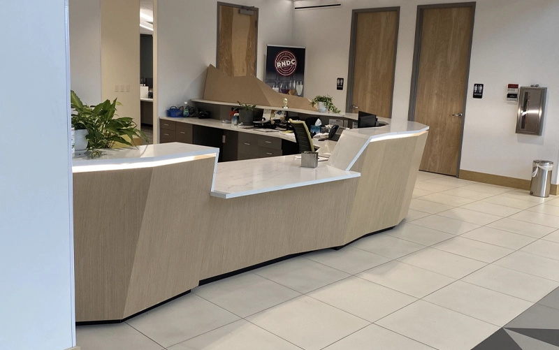 Solid surface healthcare countertop with integrated sink in a medical facility