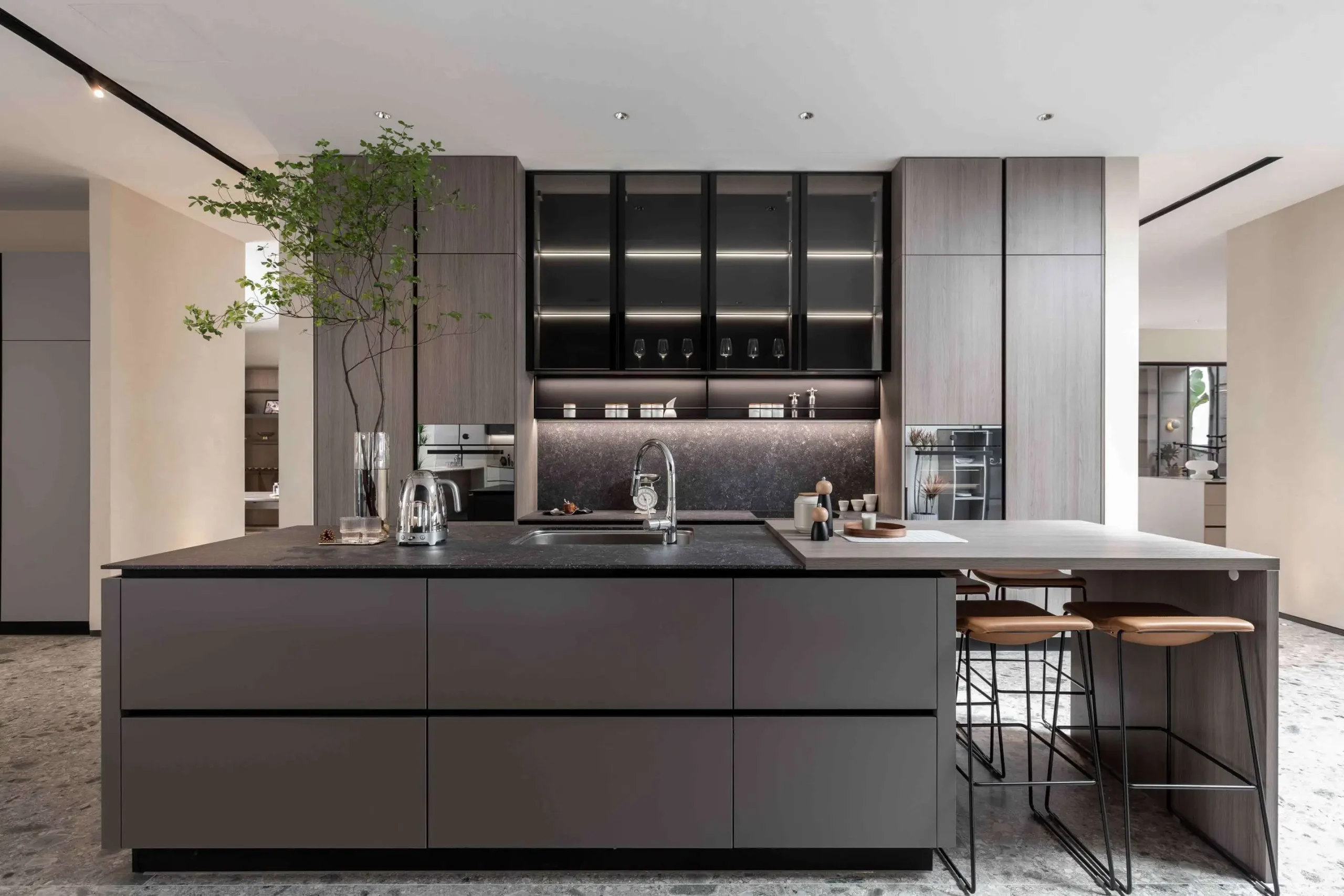 Modern kitchen with coordinated cabinets and stone countertop