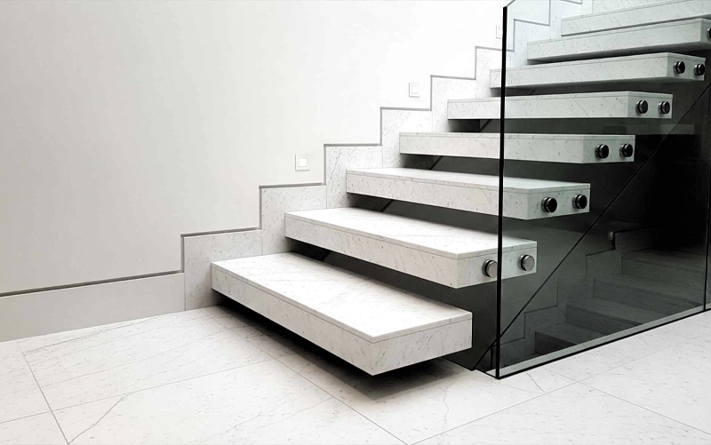 Custom stone stair treads and risers in a Toronto residential project