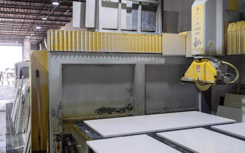 Stone fabricator preparing custom stone components for residential and architectural projects in Toronto