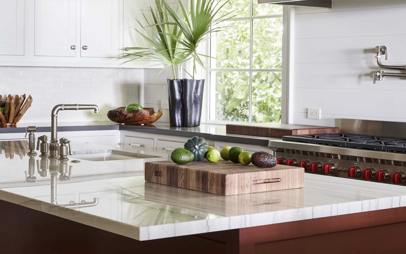Best Countertops for Serious Home Cooks High-use kitchen countertop with organized food preparation and cooking zones