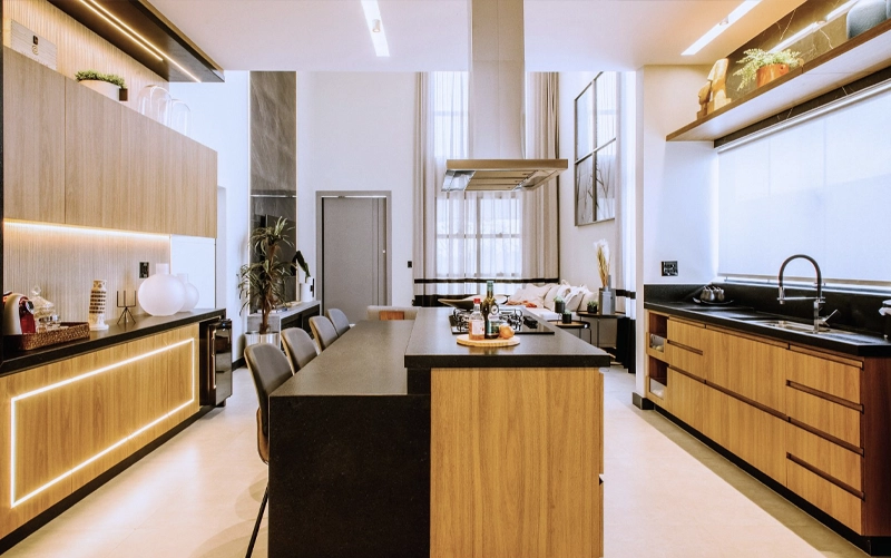 Professional Countertop Installation Professional countertop installers positioning a fabricated stone countertop in a kitchen